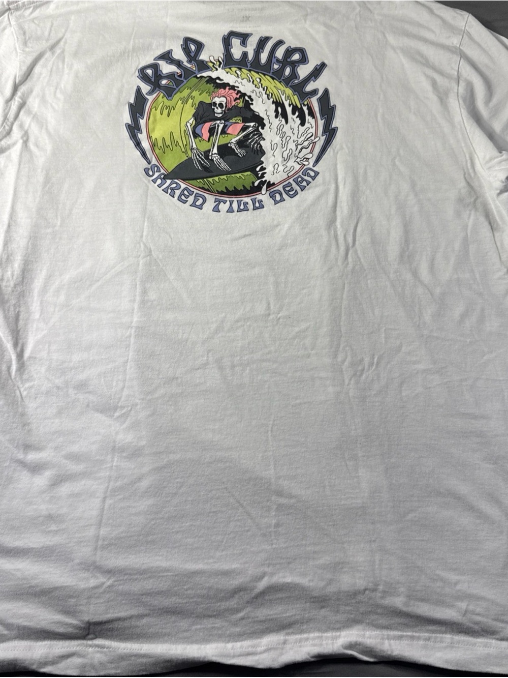 Rip Curl White Tee with Surf Skull and Neon Wave Graphic